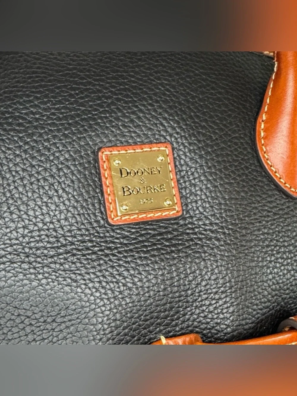 Dooney & Bourke Pebble Grain Tote bag in black with tan leather trim